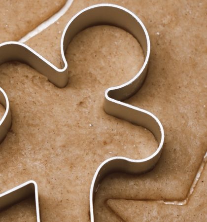 Child Lead Learning Gingerbread Man